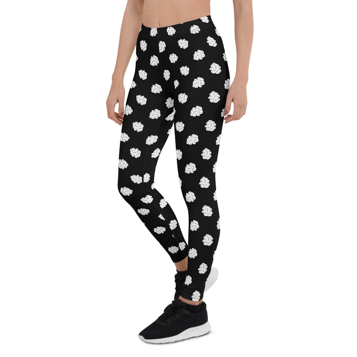 model wearing Black and white leggings with cannabis nugs in a polka dot pattern