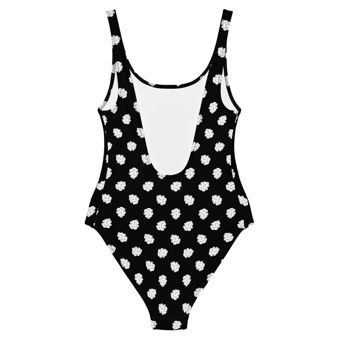 back view of black and white polda dot cannabis swimsuit