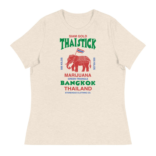 Flat lay of the Siam Gold Thai Stick Women's Relaxed T-Shirt on a white background, featuring a vintage design inspired by old flour sack-style bags from Thailand, but with a cannabis twist.