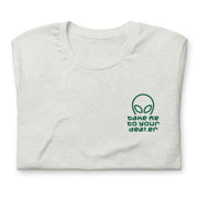 Folded Ash gray T-shirt with ‘Take Me to Your Dealer’ embroidered alien graphic on the left chest pocket area.