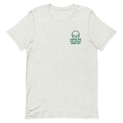 Ash gray T-shirt with ‘Take Me to Your Dealer’ embroidered alien graphic on the left chest pocket area.