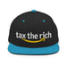 Tax The Rich - Snapback Hat laid flat on a white background, showcasing its high-profile structure, embroidered eyelets, and iconic design reminiscent of a major online retailer.